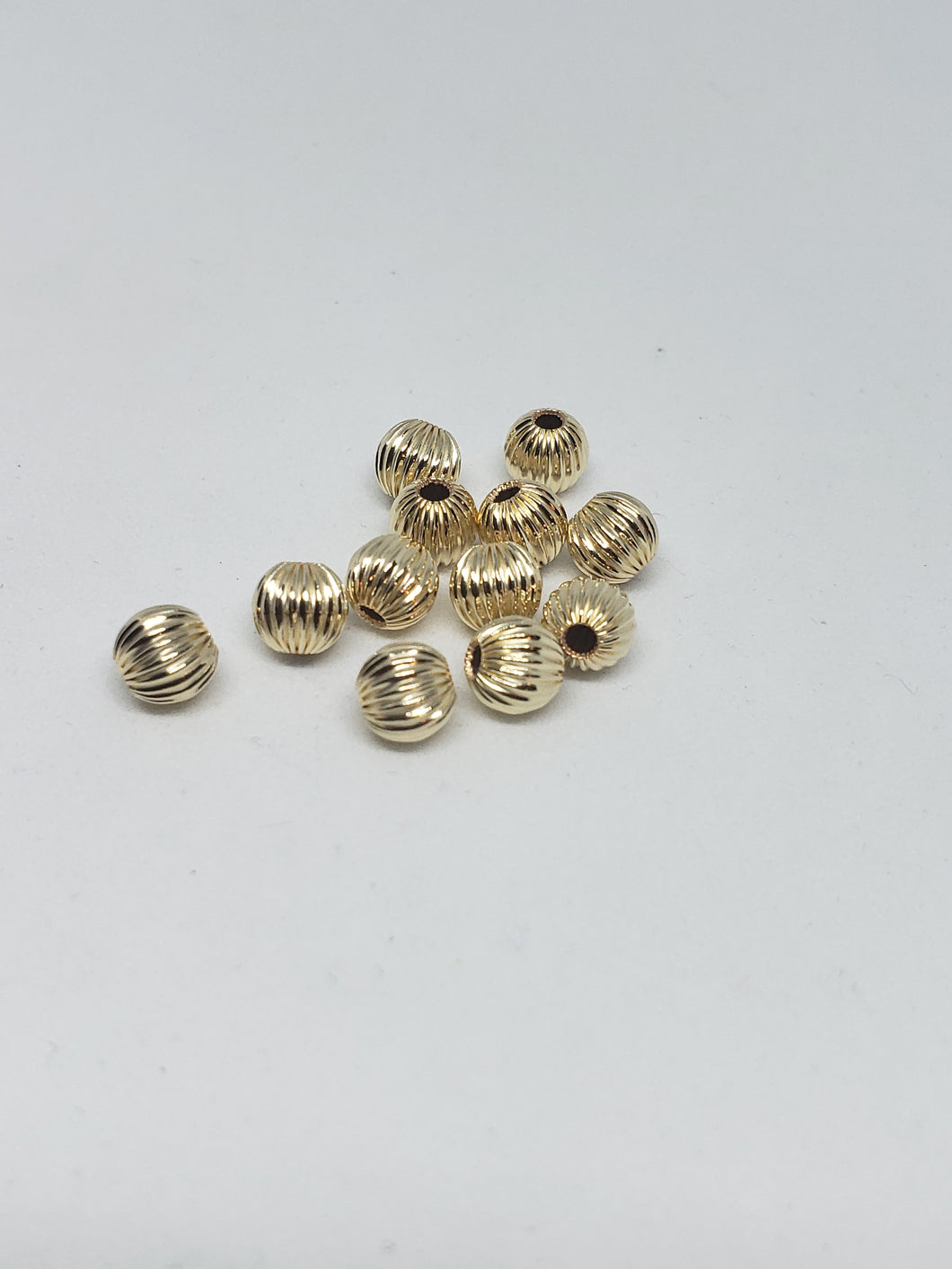 6mm corrugated Round Beads 12 pk